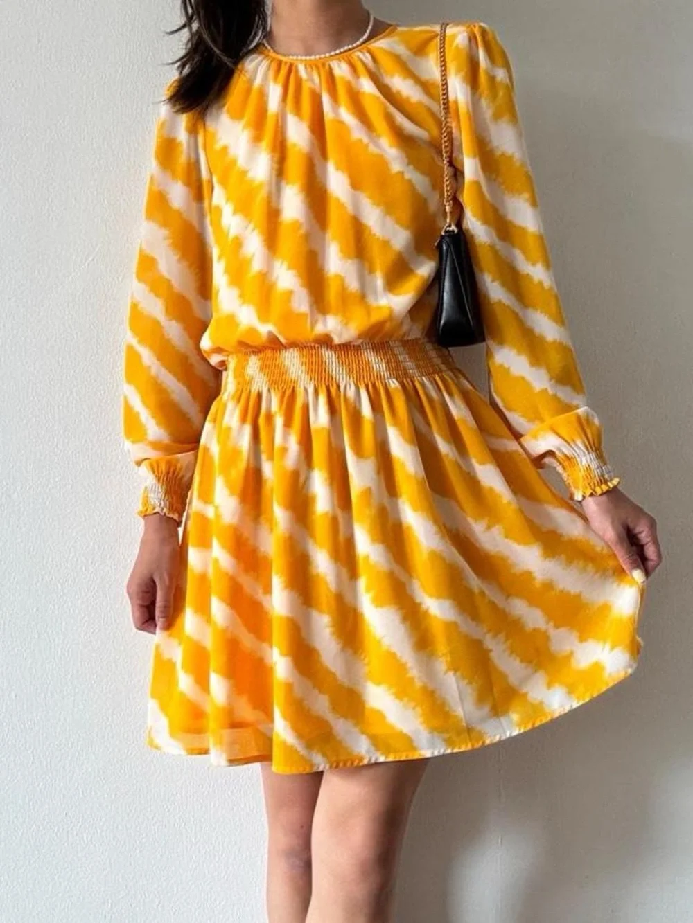Michael Kors yellow and white tie-dye mini long sleeve dress with elastic waist